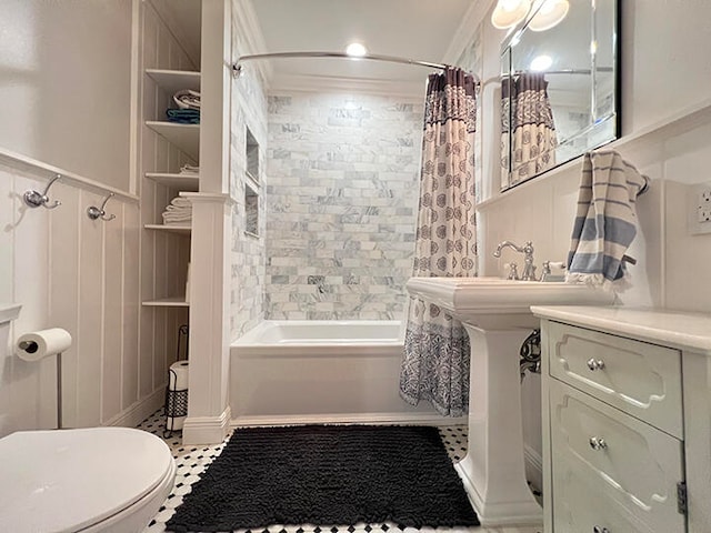 bathroom with tile patterned floors, toilet, crown molding, and shower / tub combo