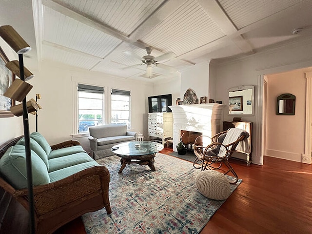 living room with ceiling fan, beam ceiling, and dark hardwood / wood-style flooring