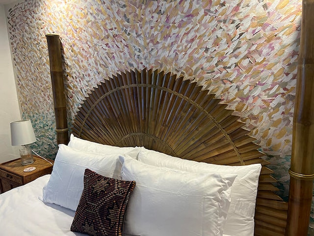 bedroom featuring lofted ceiling