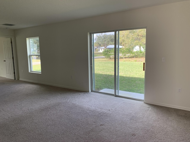 carpeted bedroom with ensuite bath