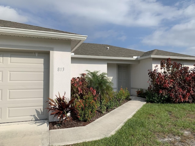 property entrance featuring a garage