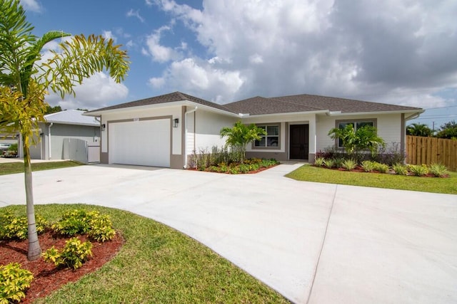 single story home featuring a garage