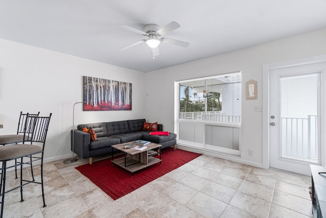 living room with ceiling fan