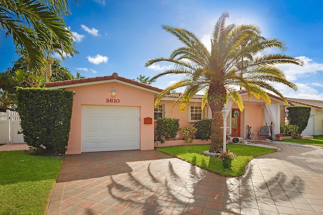 view of front of property with a garage