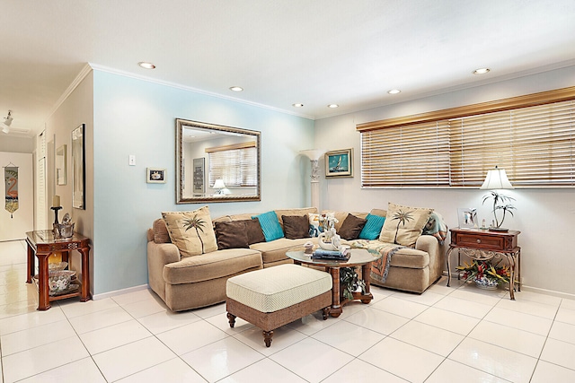 living room featuring ornamental molding and light tile patterned floors