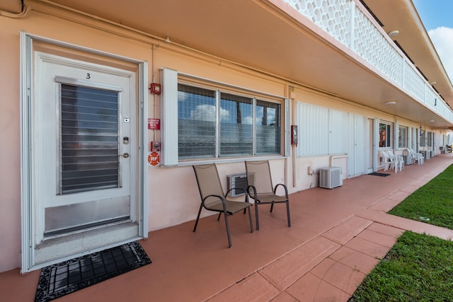 doorway to property featuring a patio area