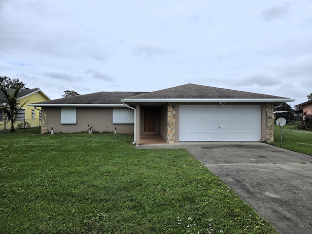 ranch-style home featuring stone siding, an attached garage, driveway, and a front lawn