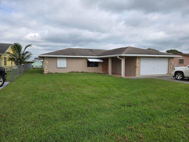 ranch-style house with a garage and a front yard