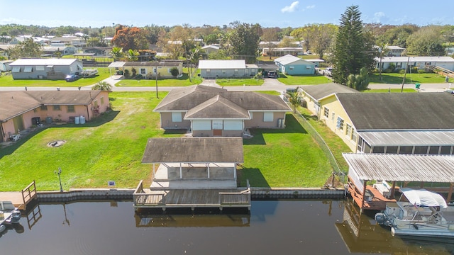 aerial view featuring a residential view and a water view