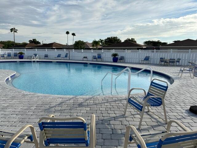 view of swimming pool featuring a patio area