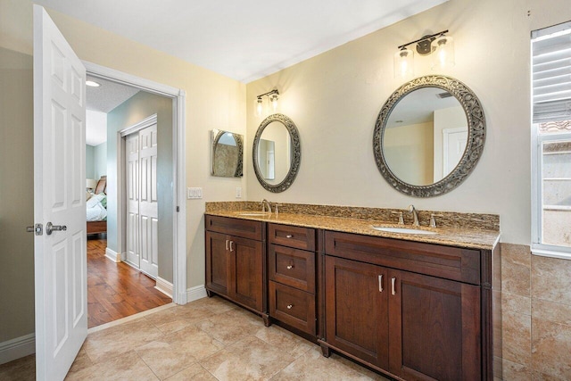 bathroom featuring hardwood / wood-style floors and vanity