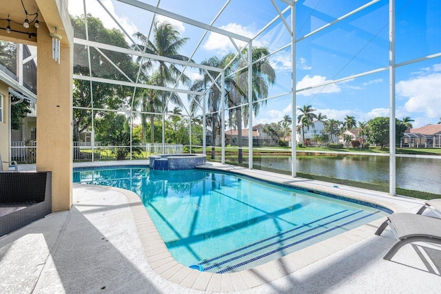 view of swimming pool featuring a lanai, an in ground hot tub, a water view, and a patio