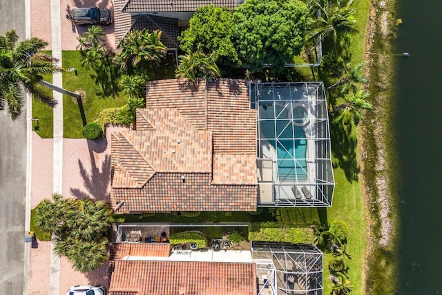 birds eye view of property featuring a water view