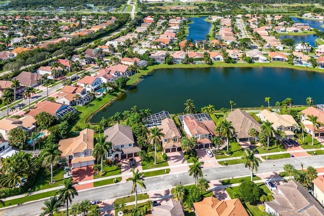 aerial view with a residential view and a water view