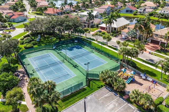 aerial view with a water view and a residential view