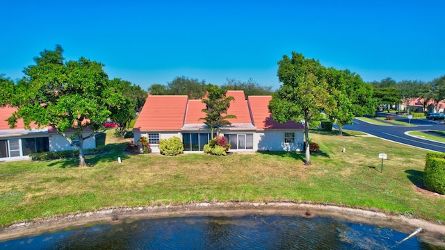 bird's eye view with a water view