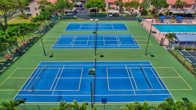 view of tennis court with basketball court