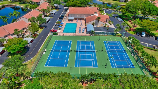 birds eye view of property featuring a water view