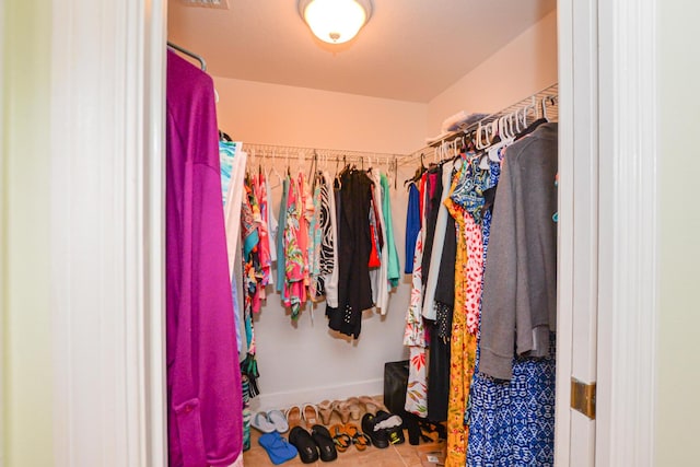 bedroom featuring carpet flooring, a closet, and ceiling fan