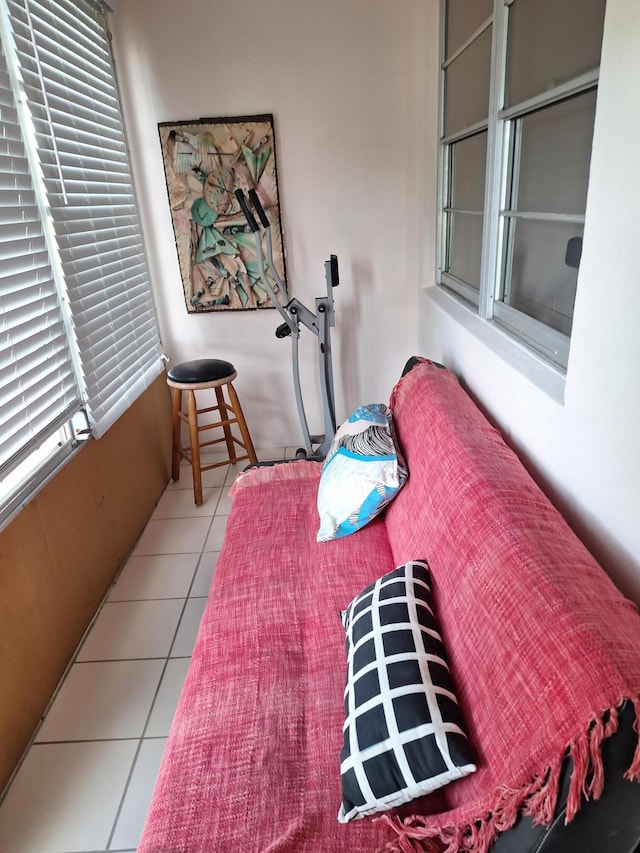 bedroom featuring light tile patterned flooring