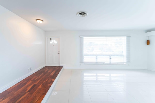 foyer with tile patterned flooring