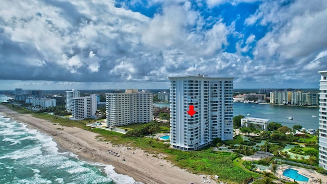 drone / aerial view with a view of the beach and a water view