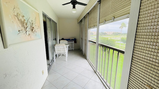 hallway featuring light tile patterned floors