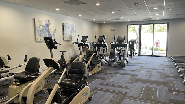 6936 Huntington Ln Unit 405, Delray Beach, FL 33446 - workout area with a paneled ceiling