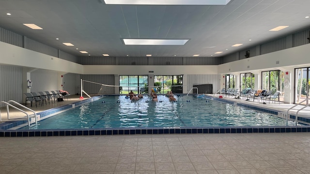 view of pool featuring a skylight