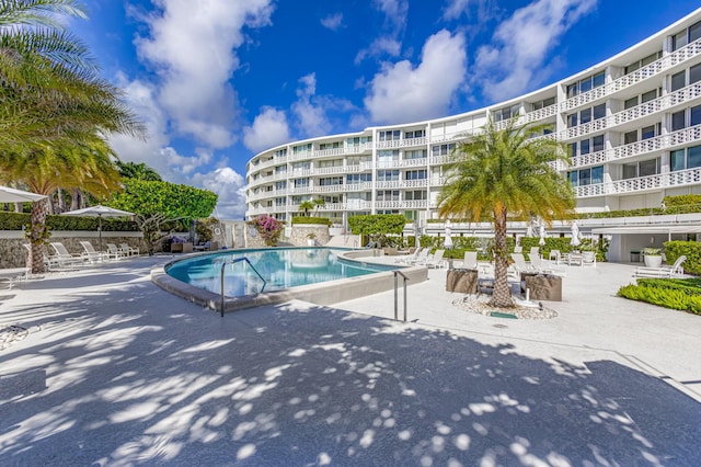 view of pool featuring a patio area