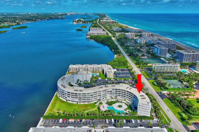 birds eye view of property featuring a water view