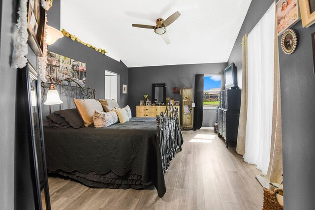 tiled dining room featuring ceiling fan and high vaulted ceiling