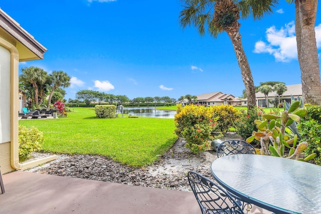 view of yard with a water view