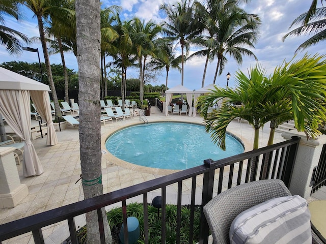 view of pool with a gazebo and a patio area