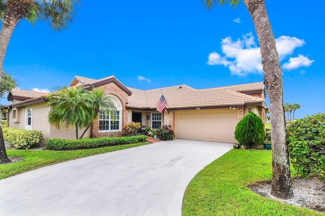 ranch-style home with a front yard and a garage