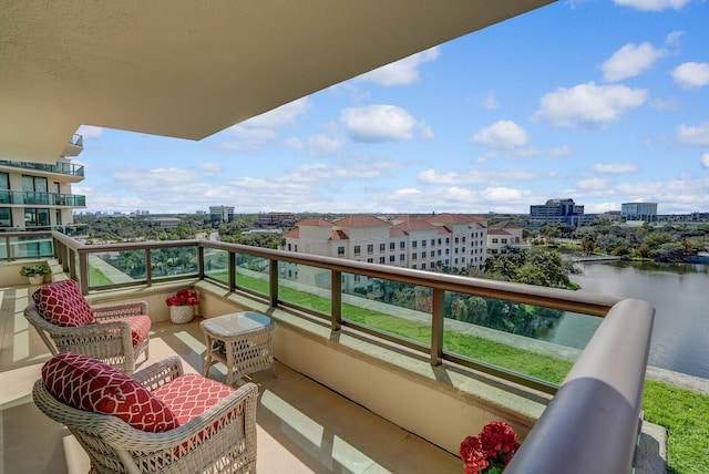 balcony featuring a water view