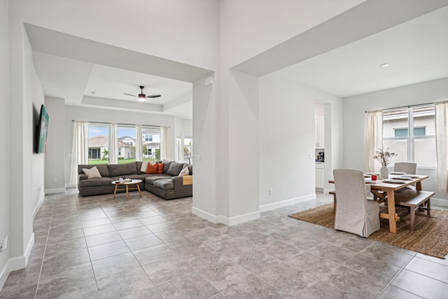 dining room featuring ceiling fan and light tile patterned flooring