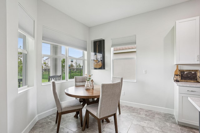 dining room featuring light tile patterned floors