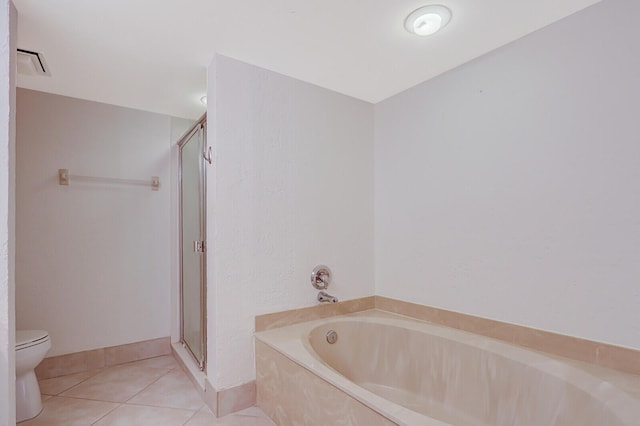 bathroom with tile patterned floors, separate shower and tub, and toilet