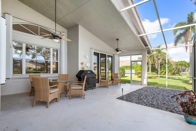 sunroom / solarium with ceiling fan