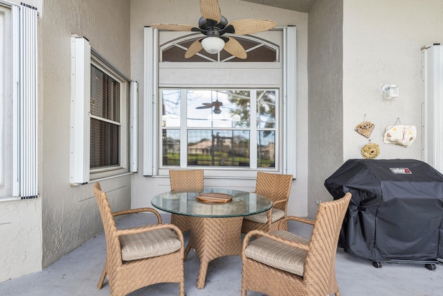 dining area with ceiling fan and vaulted ceiling