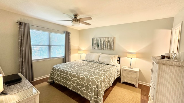 bedroom featuring hardwood / wood-style floors and ceiling fan