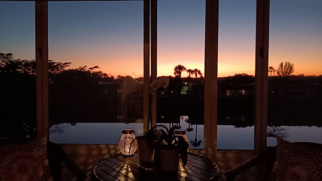 154 Lake Meryl Dr Unit 257, West Palm Beach, FL 33411 - view of patio / terrace featuring a water view