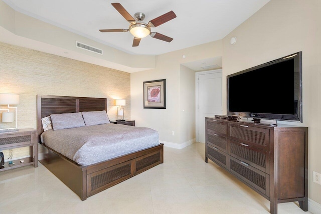 bedroom featuring ceiling fan and light tile patterned floors