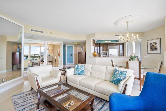 living room with an inviting chandelier