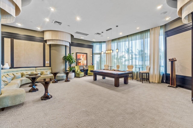 recreation room with light carpet and pool table