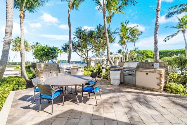 view of patio / terrace with an outdoor kitchen and grilling area