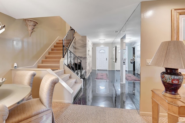 entrance foyer with tile patterned floors