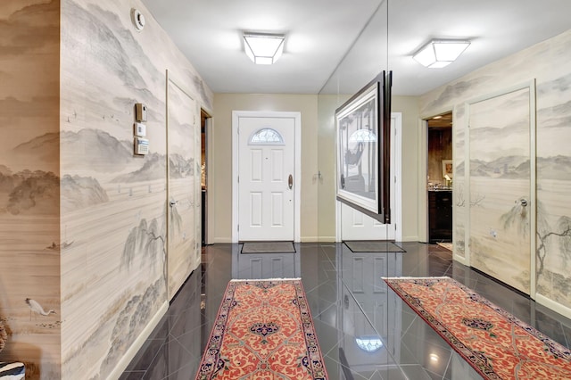 interior space featuring dark tile patterned flooring