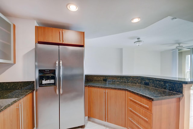 610 Clematis St Unit 638, West Palm Beach, FL 33401 - kitchen featuring stainless steel fridge with ice dispenser, a peninsula, dark stone countertops, a ceiling fan, and recessed lighting